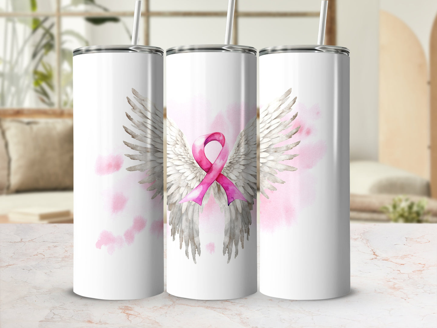 Three white tumblers with pink angel wings and a breast cancer ribbon design.