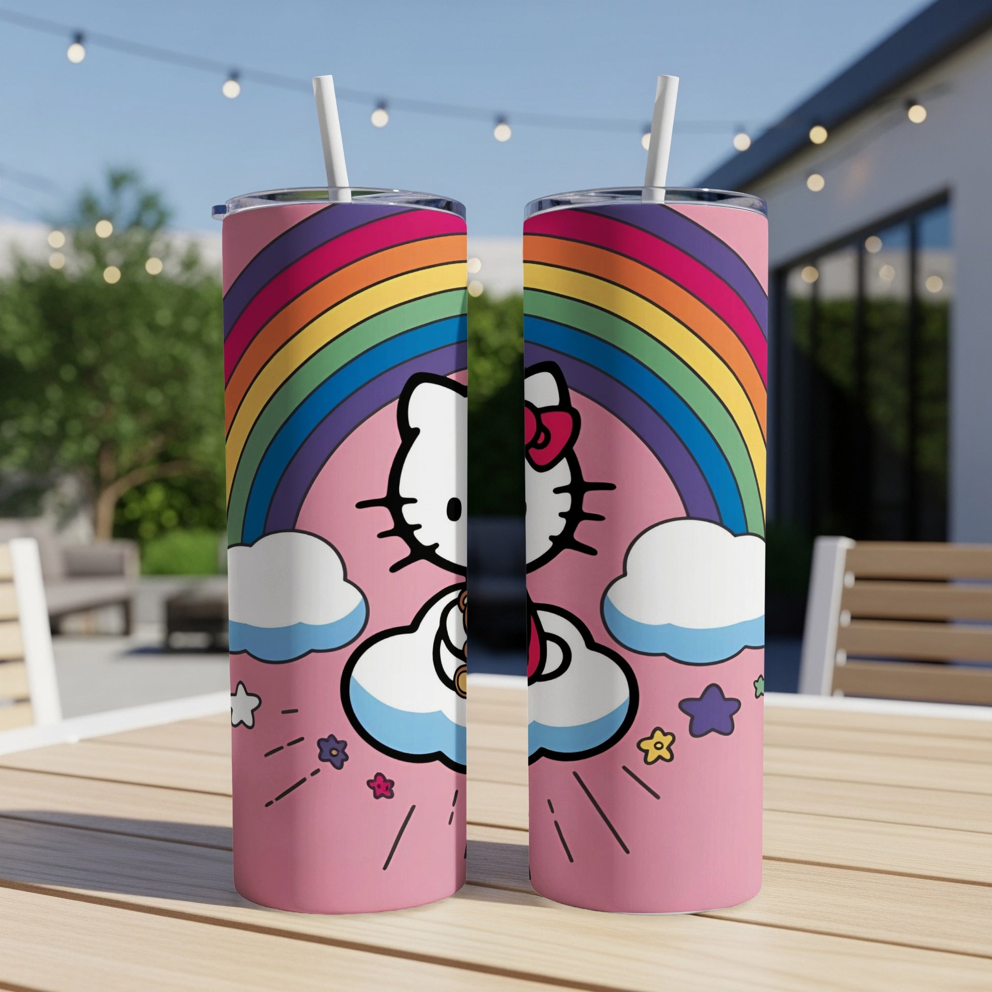 Hello Kitty on a pink tumbler with a rainbow and clouds.