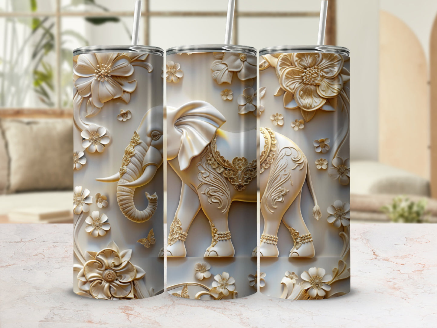 3D embossed elephant with floral accents on a white tumbler with straw.