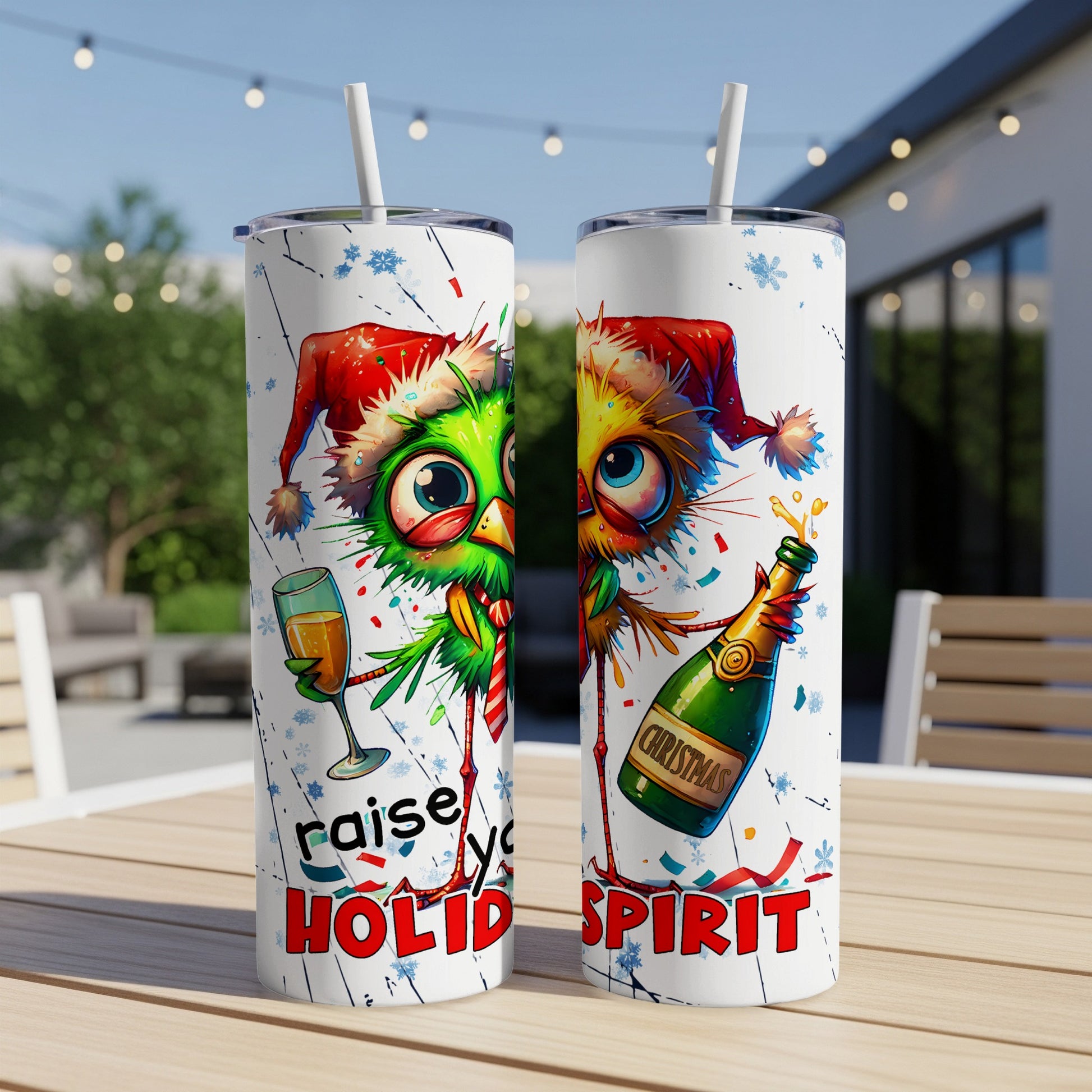 Two tumblers with a festive cartoon bird wearing a Santa hat, holding champagne.