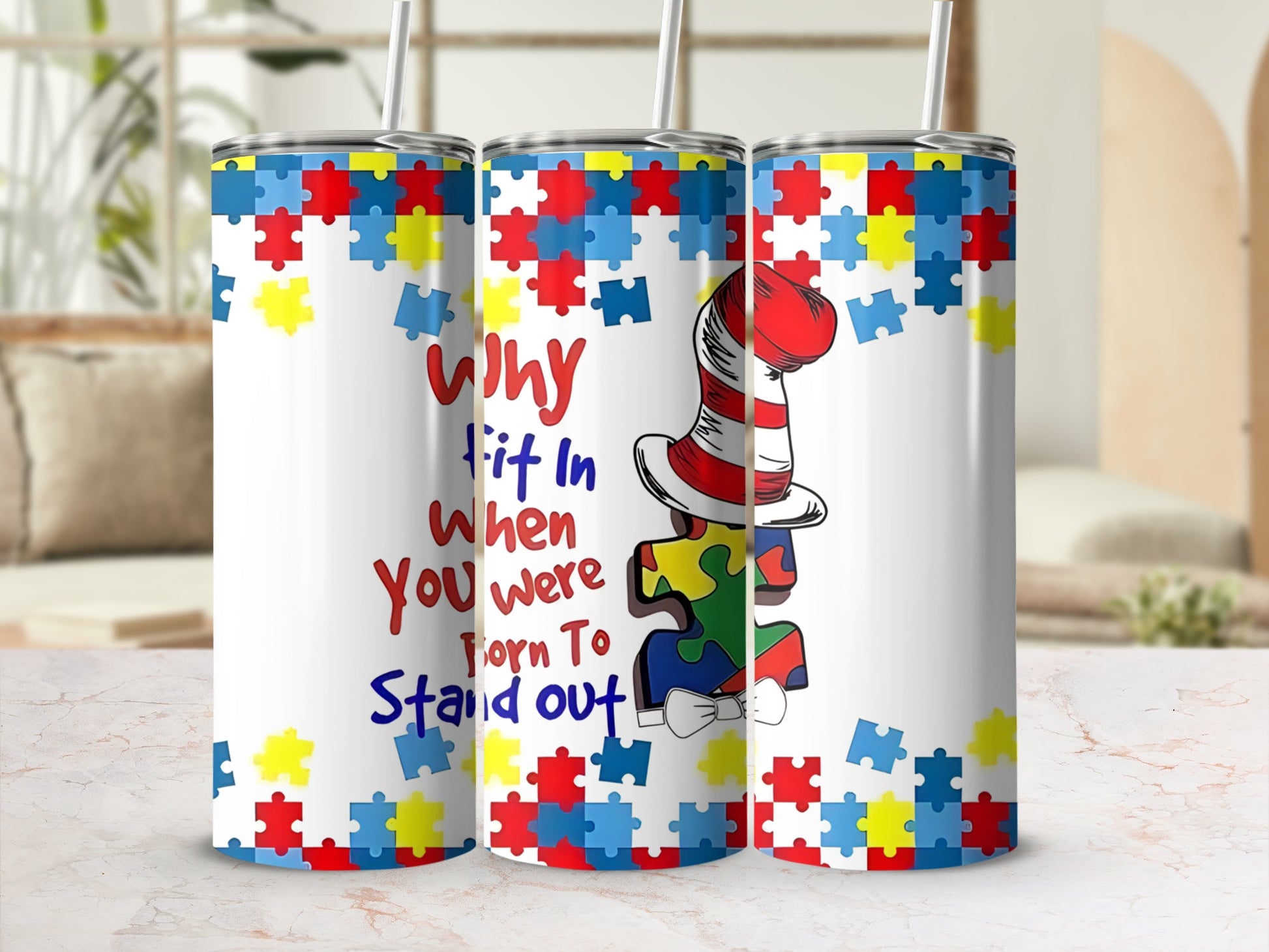 Tumbler with puzzle pieces and Dr. Seuss hat saying "Why fit in when you were born to stand out?"