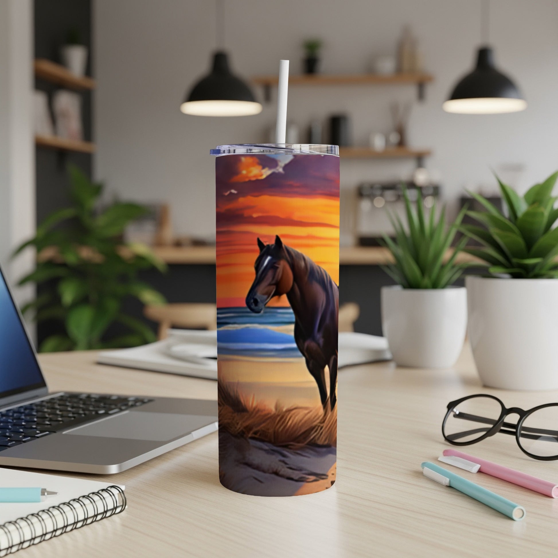 Horse silhouette on beach at sunset on a skinny tumbler.