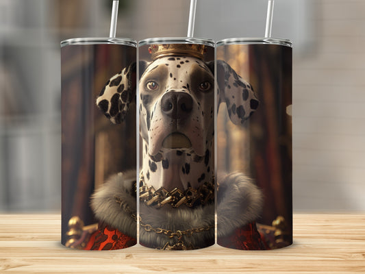 Dalmatian wearing a crown and fur collar sits regally on a throne.