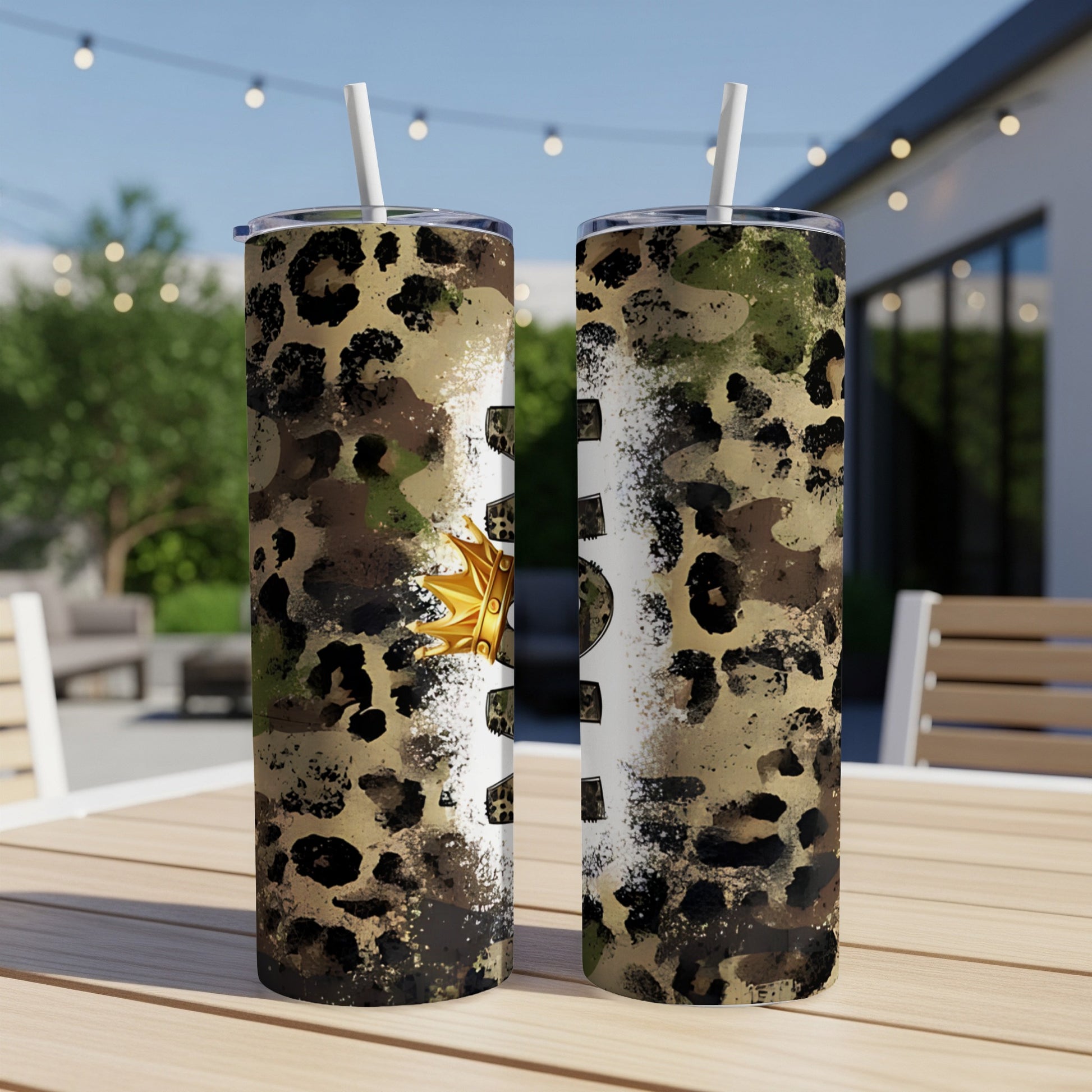 Two tumblers with leopard print and camouflage design, crowned with a gold crown.