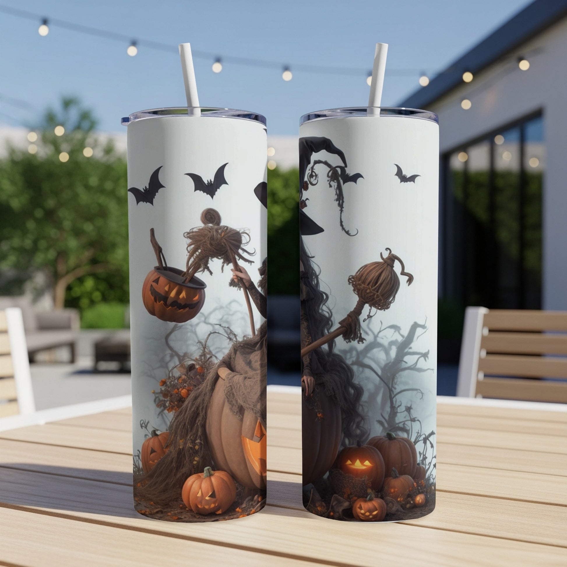 Two tumblers with Halloween witch and pumpkin designs, featuring bats and spooky trees.