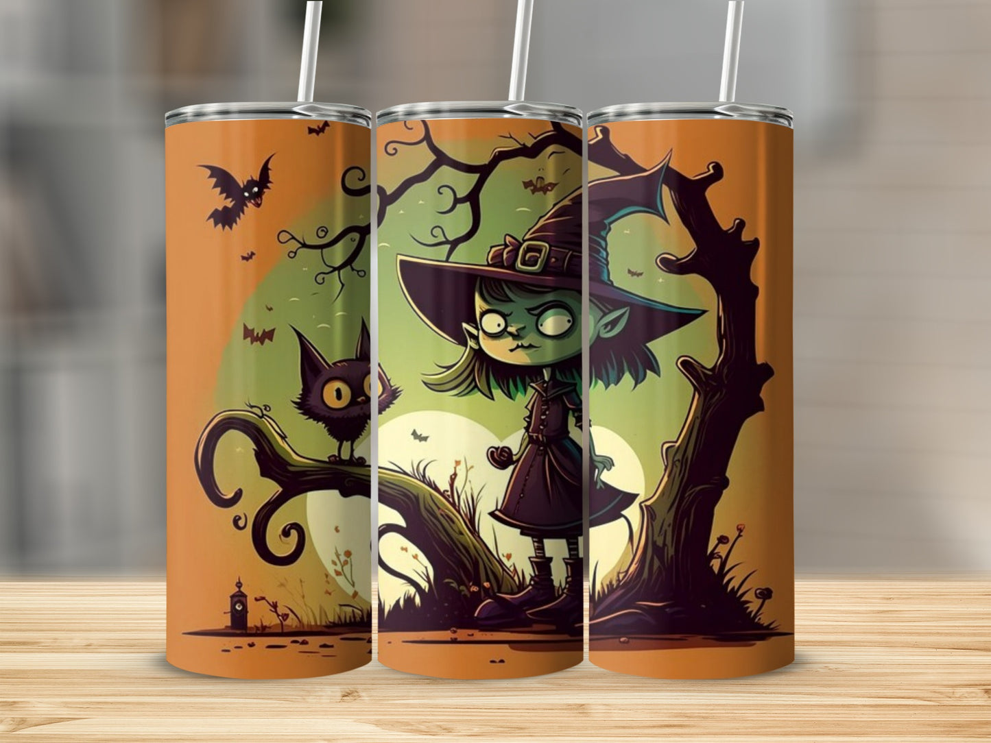 Three tumblers with a cartoon witch, black cat, and bats on a Halloween background.