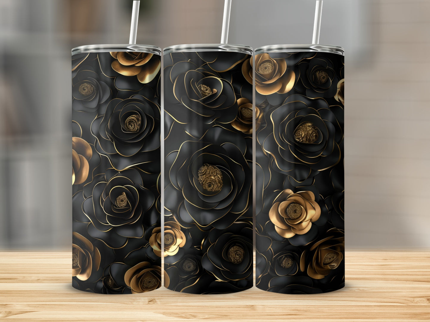 Three black tumblers with gold rose floral pattern.