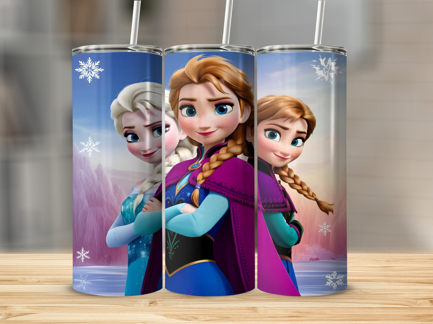 Elsa and Anna from Frozen on a blue tumbler with snowflakes.