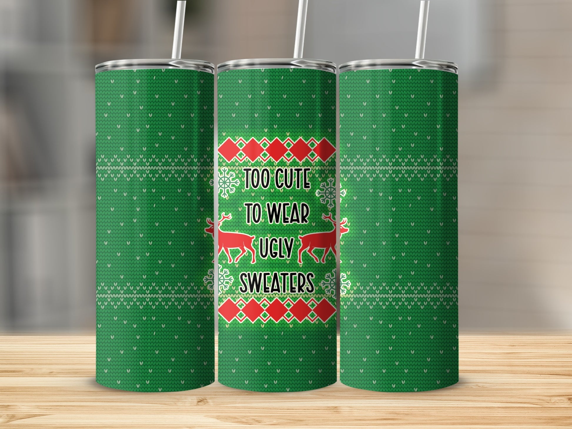 Green tumbler with "Too Cute to Wear Ugly Sweaters" and deer design.