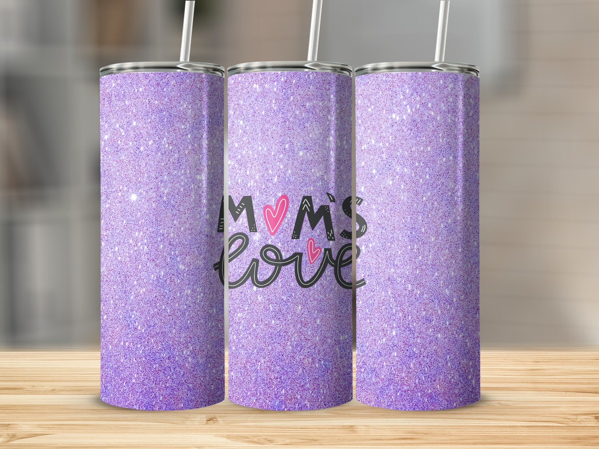 Purple glitter tumbler with "Mom's Love" text.