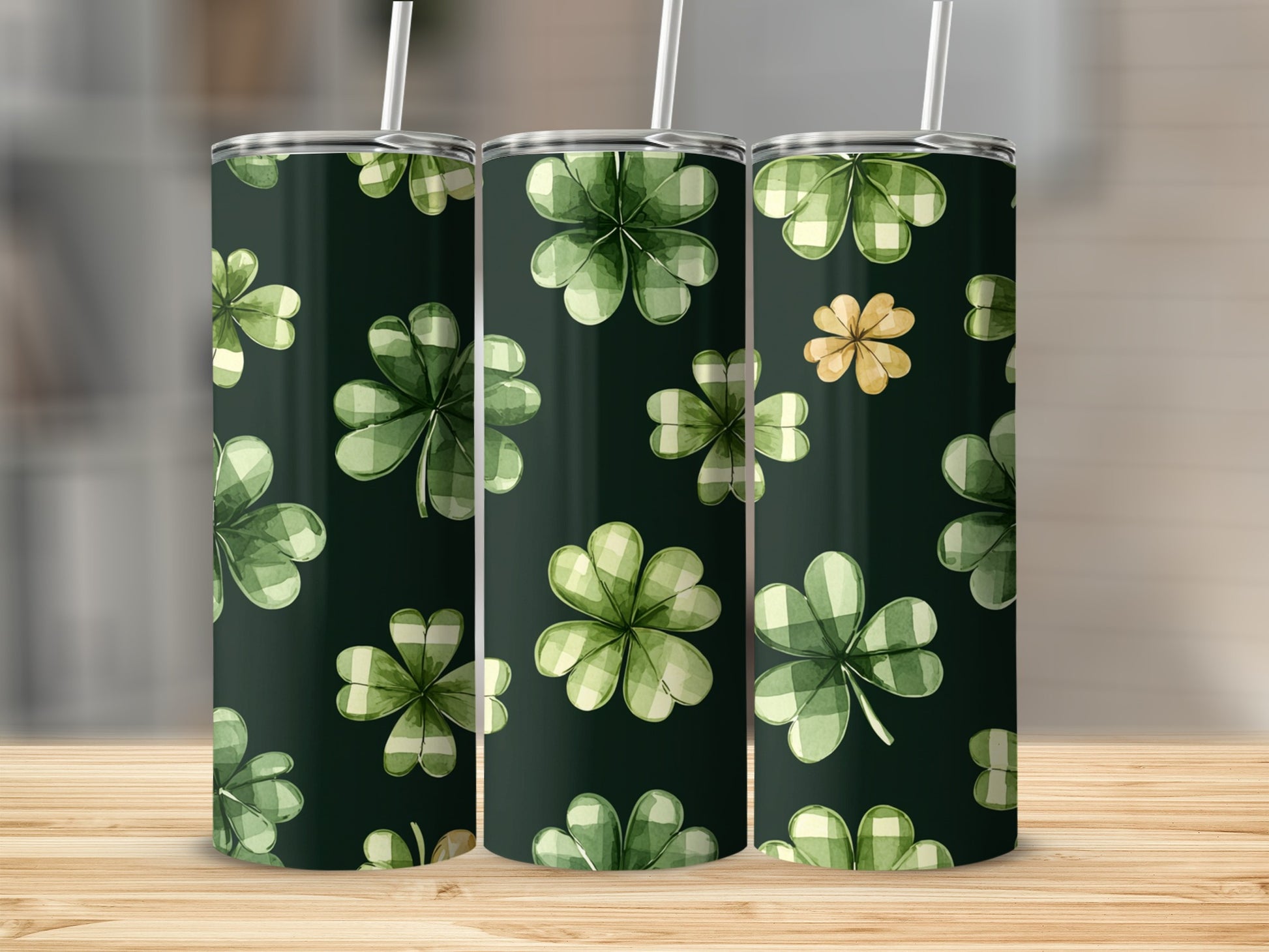 Green plaid shamrocks on dark background, two tumblers visible.