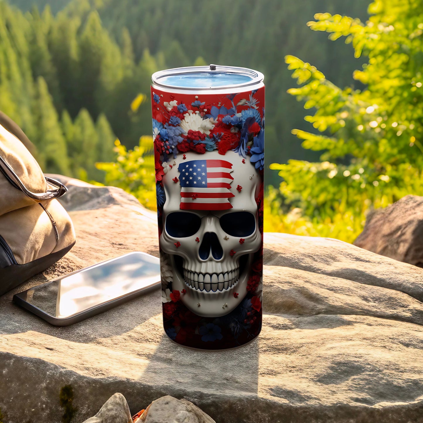 Skull with American flag and floral design on a tumbler.
