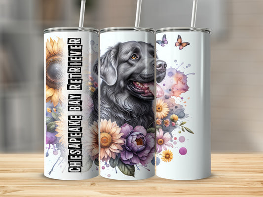 Black Chesapeake Bay Retriever with sunflowers and flowers on a tumbler.