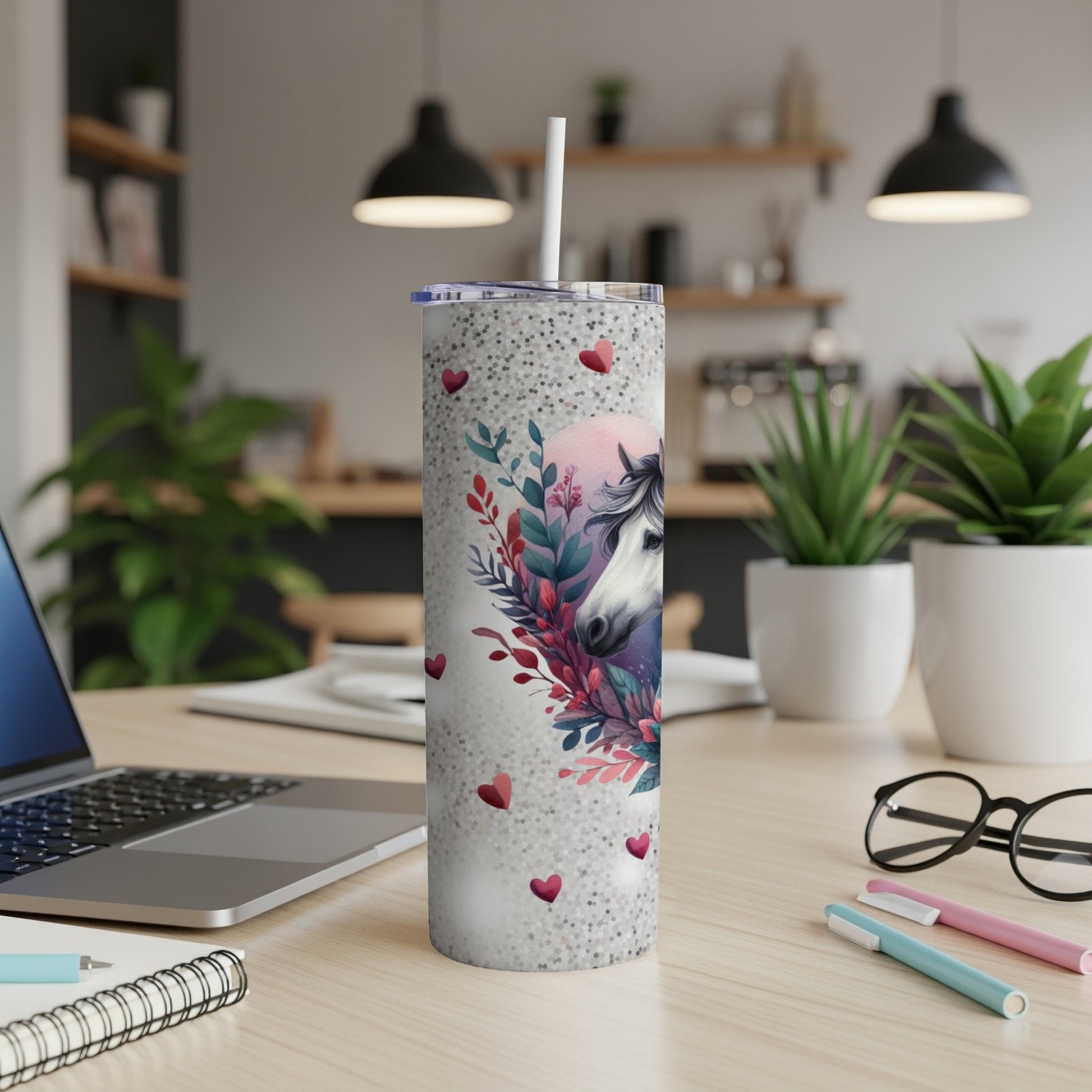 White tumbler with horse design and scattered pink hearts.