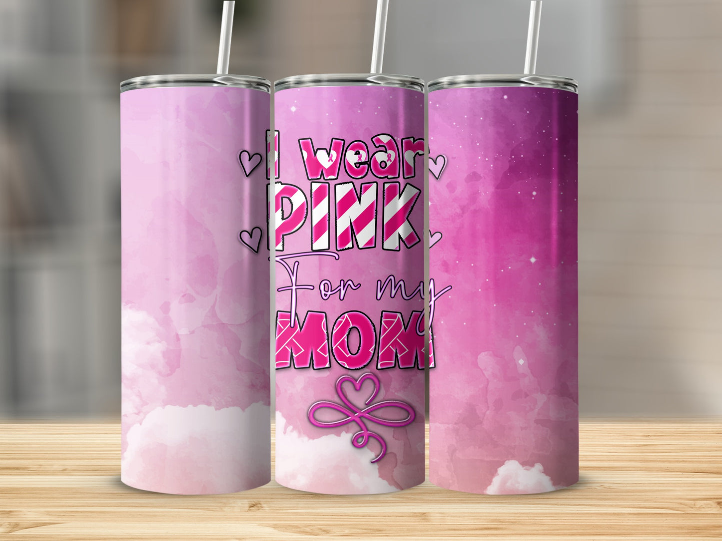 Pink tumbler with "I wear PINK for my Mom" text.