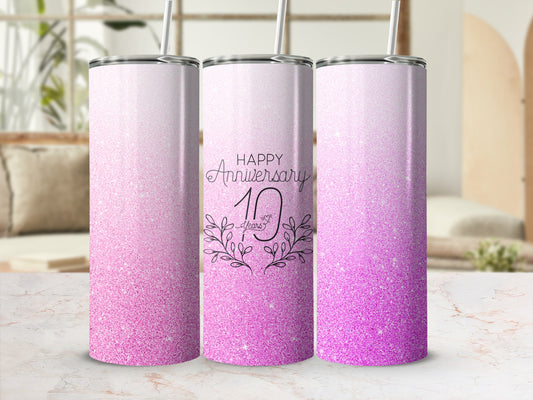 Pink glitter tumbler with "Happy Anniversary 10 Years" text.