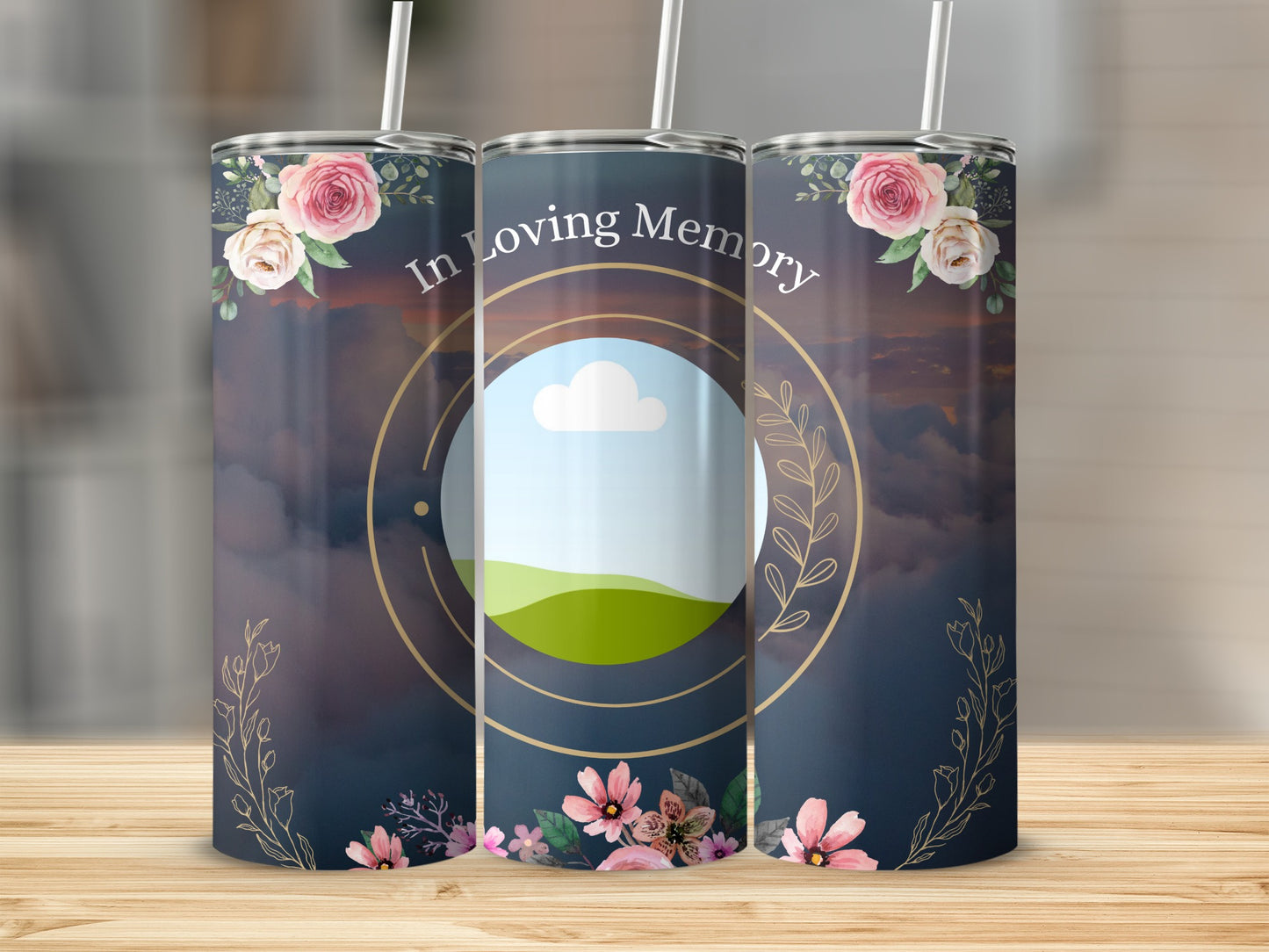 Tumbler with floral design and "In Loving Memory" text on a cloudy sky background.