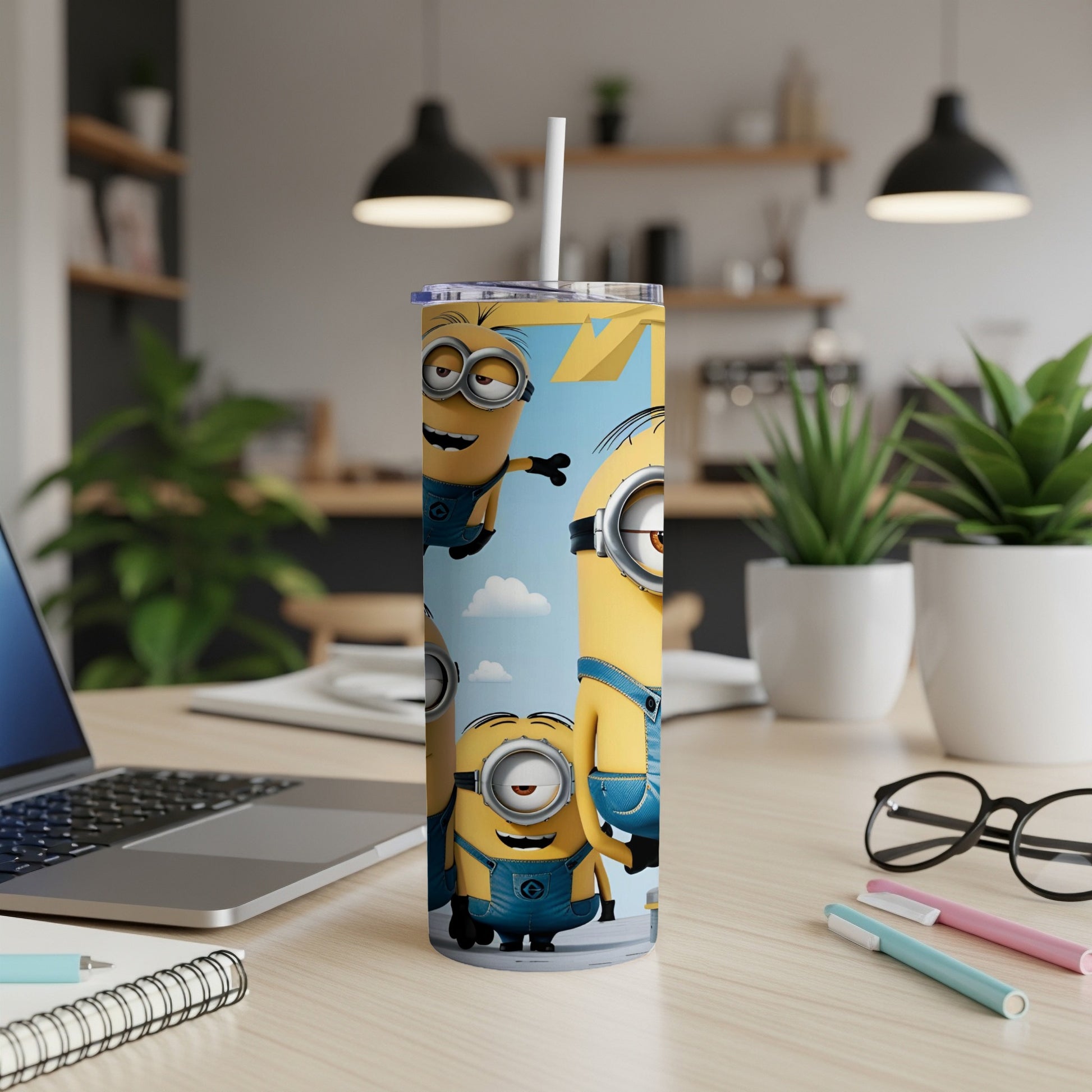 Minions characters on a white and blue tumbler with a straw.