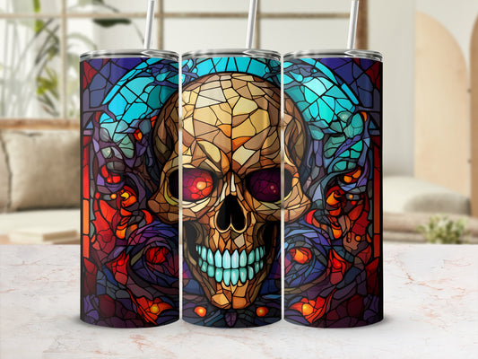 Stained glass skull design on three tumbler cups with straws.