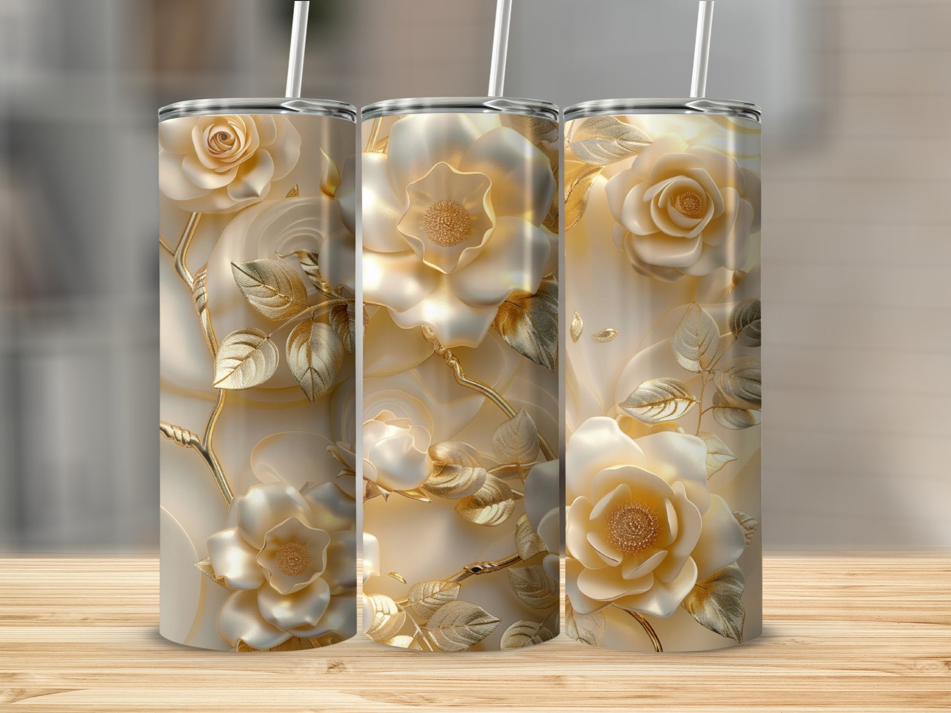 Three gold-embossed cream roses on a textured background, on tumblers.