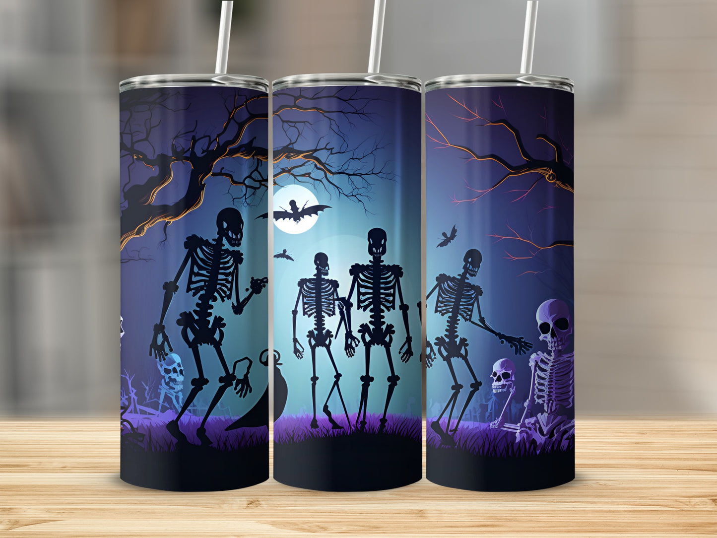 Three tumblers with Halloween skeletons, bats, and a full moon in a spooky forest scene.