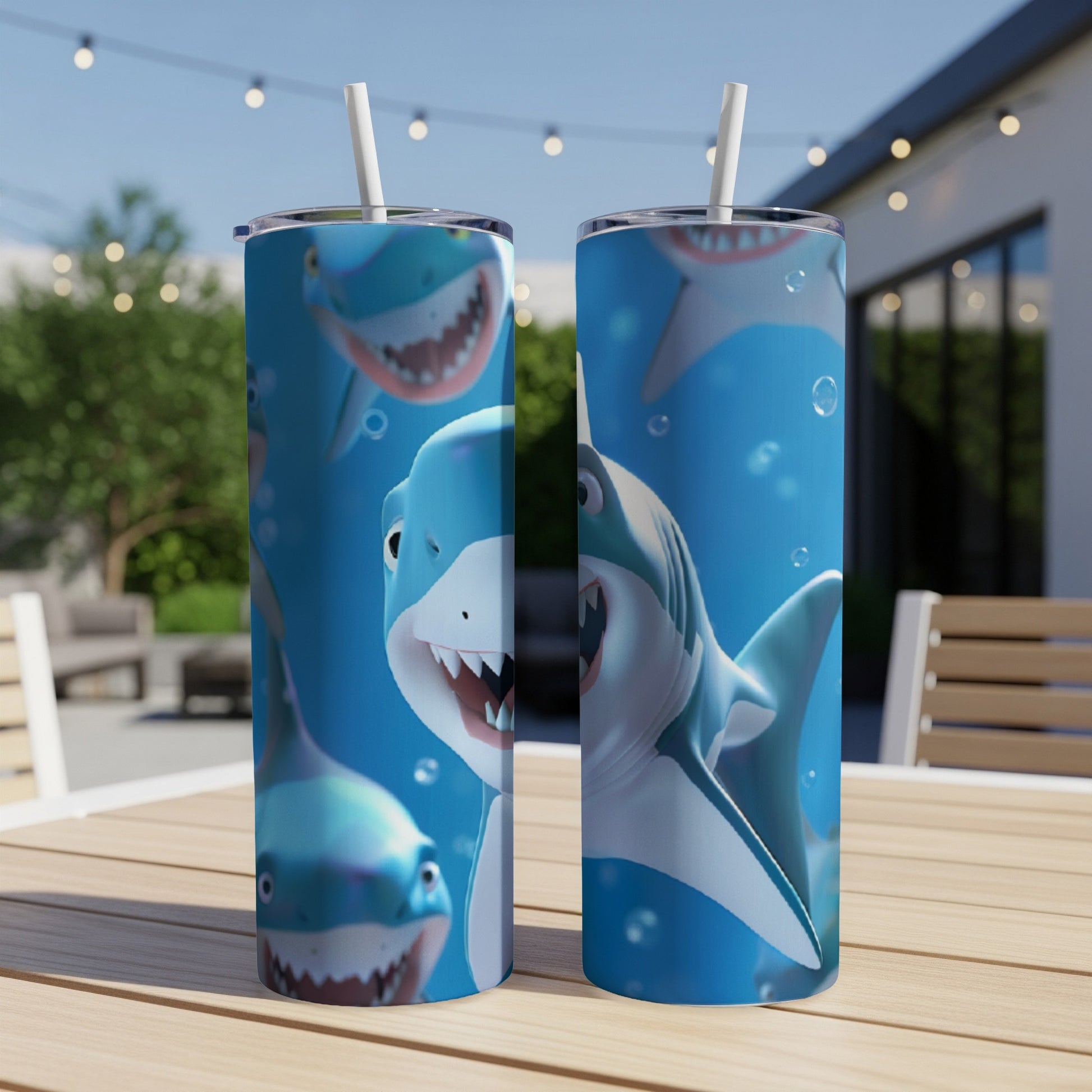 Two tumblers featuring cartoon sharks with open mouths and bubbles.