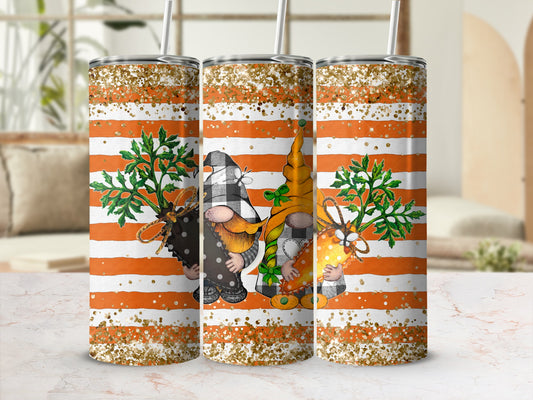 Three tumblers with gnome designs and orange and white stripes.