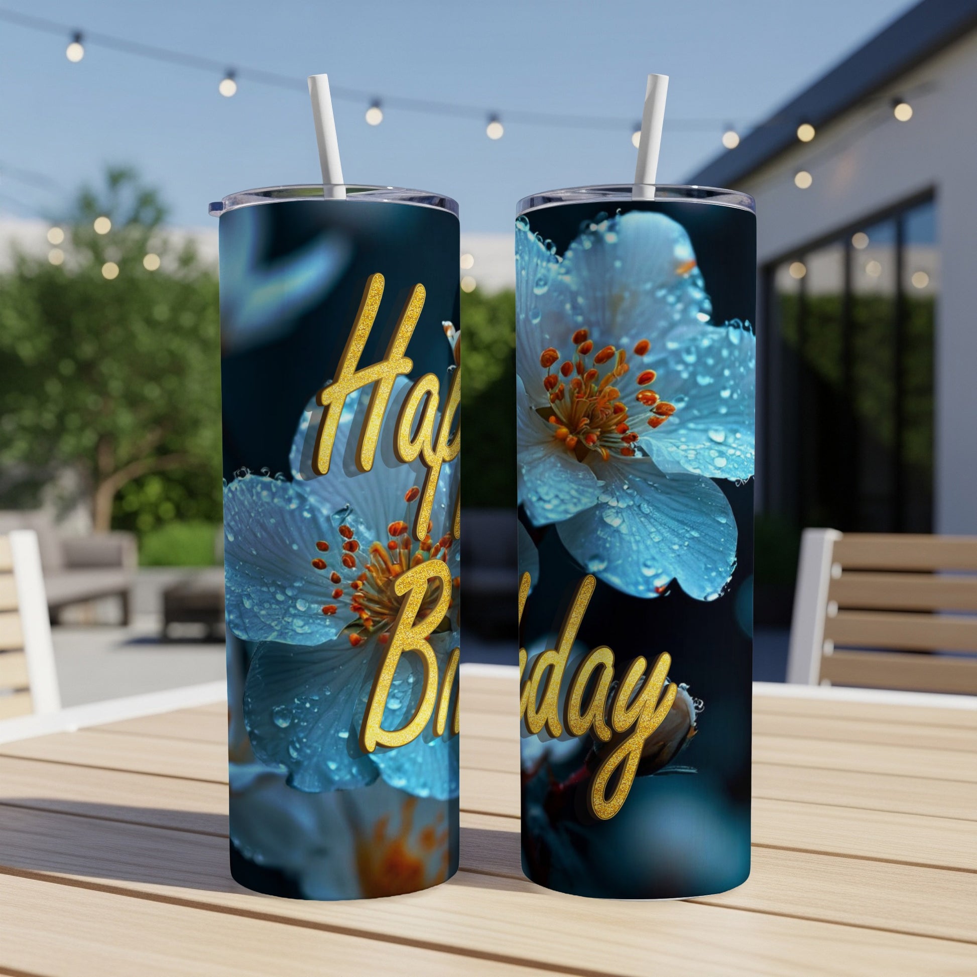 Two tumblers with "Happy Birthday" text and close-up of wet blue flowers.