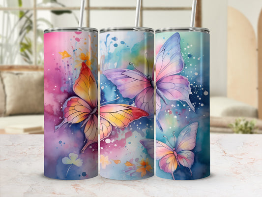 Three watercolor butterfly tumblers with floral accents and pastel colors.
