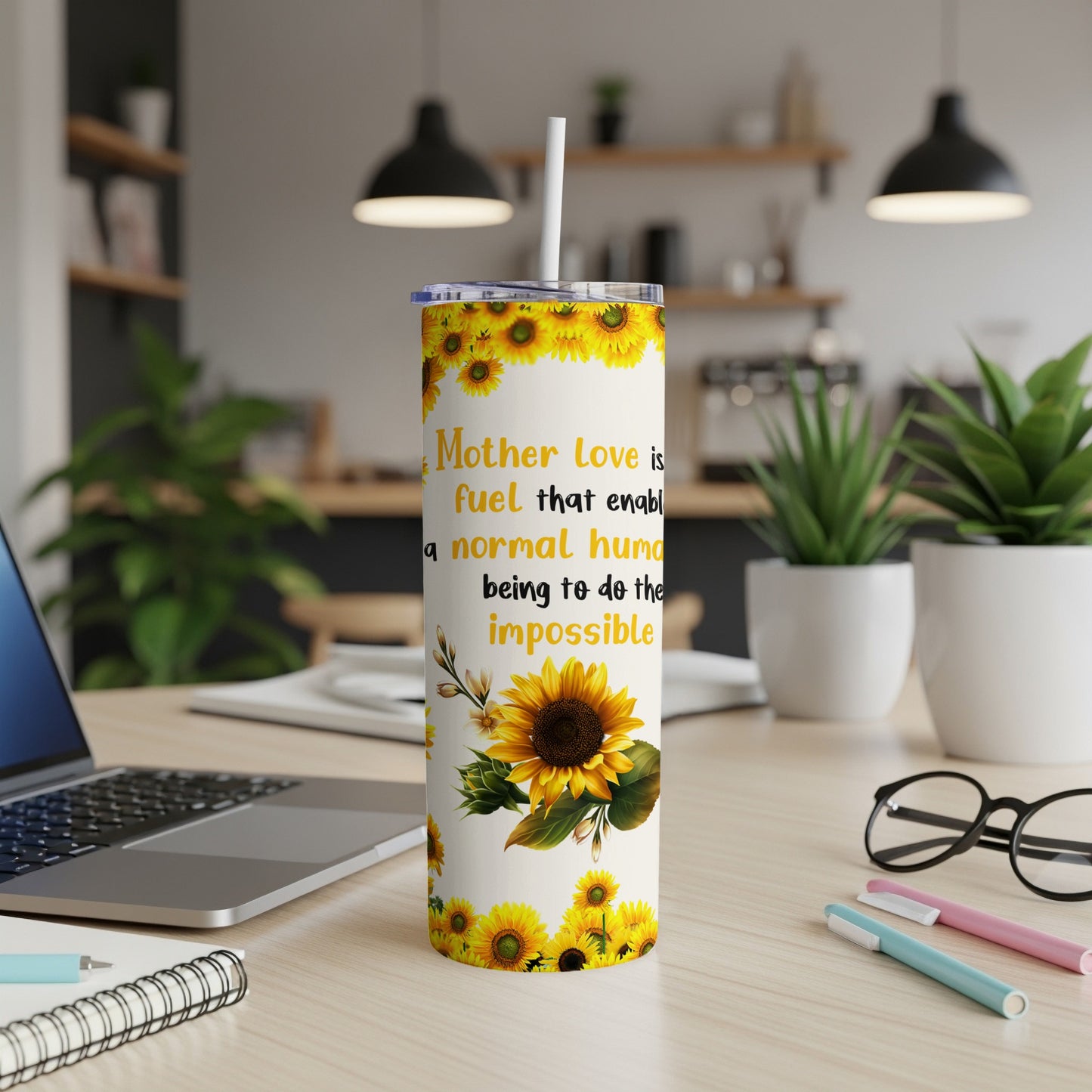 Sunflower tumbler with text "Mother Love is fuel that enables a normal human being to do the impossible".