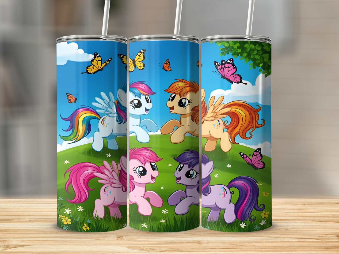 Three My Little Pony tumblers with butterflies and a colorful background.