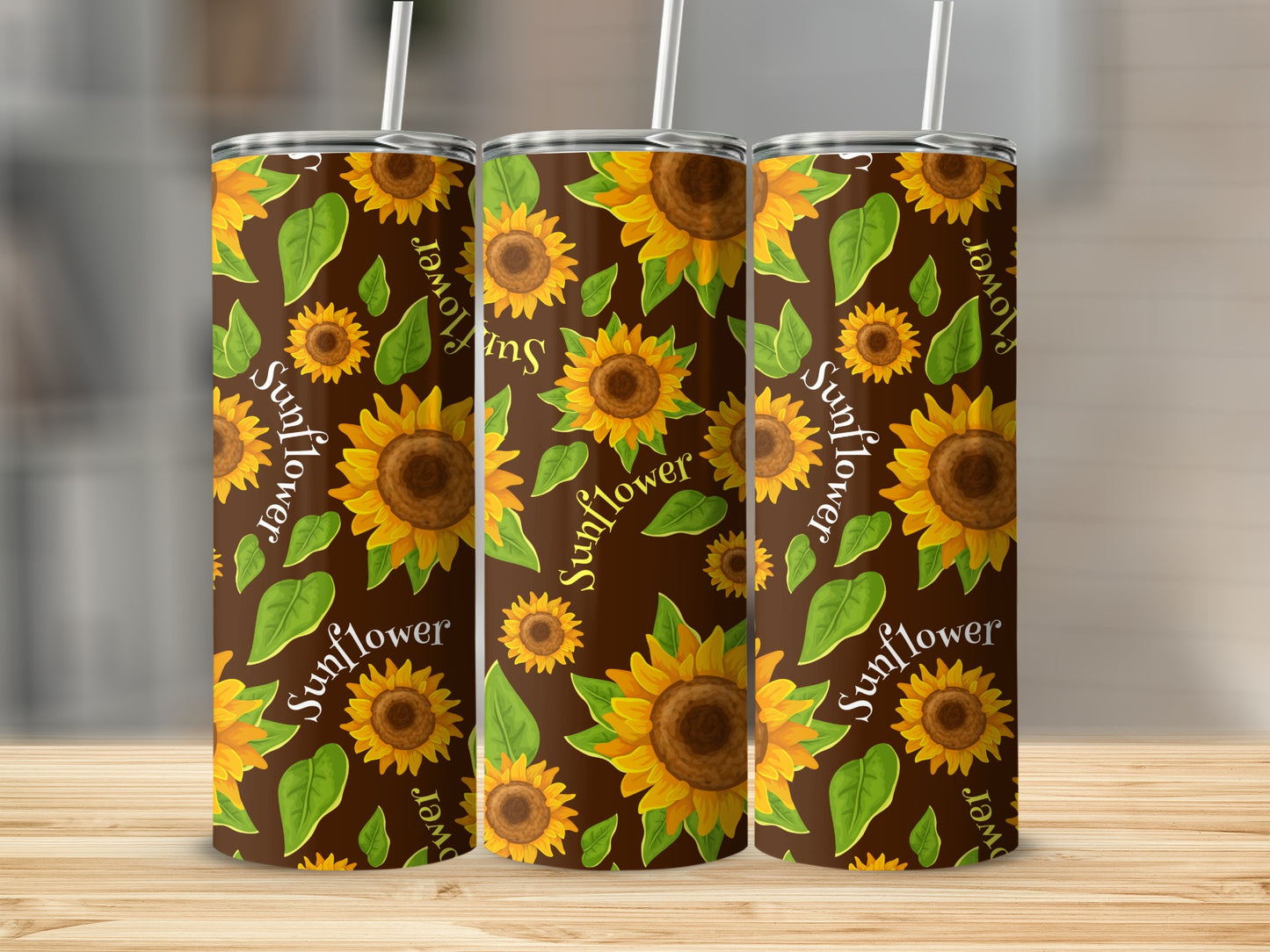 Three tumblers with a brown background featuring a repeating sunflower and leaf pattern.