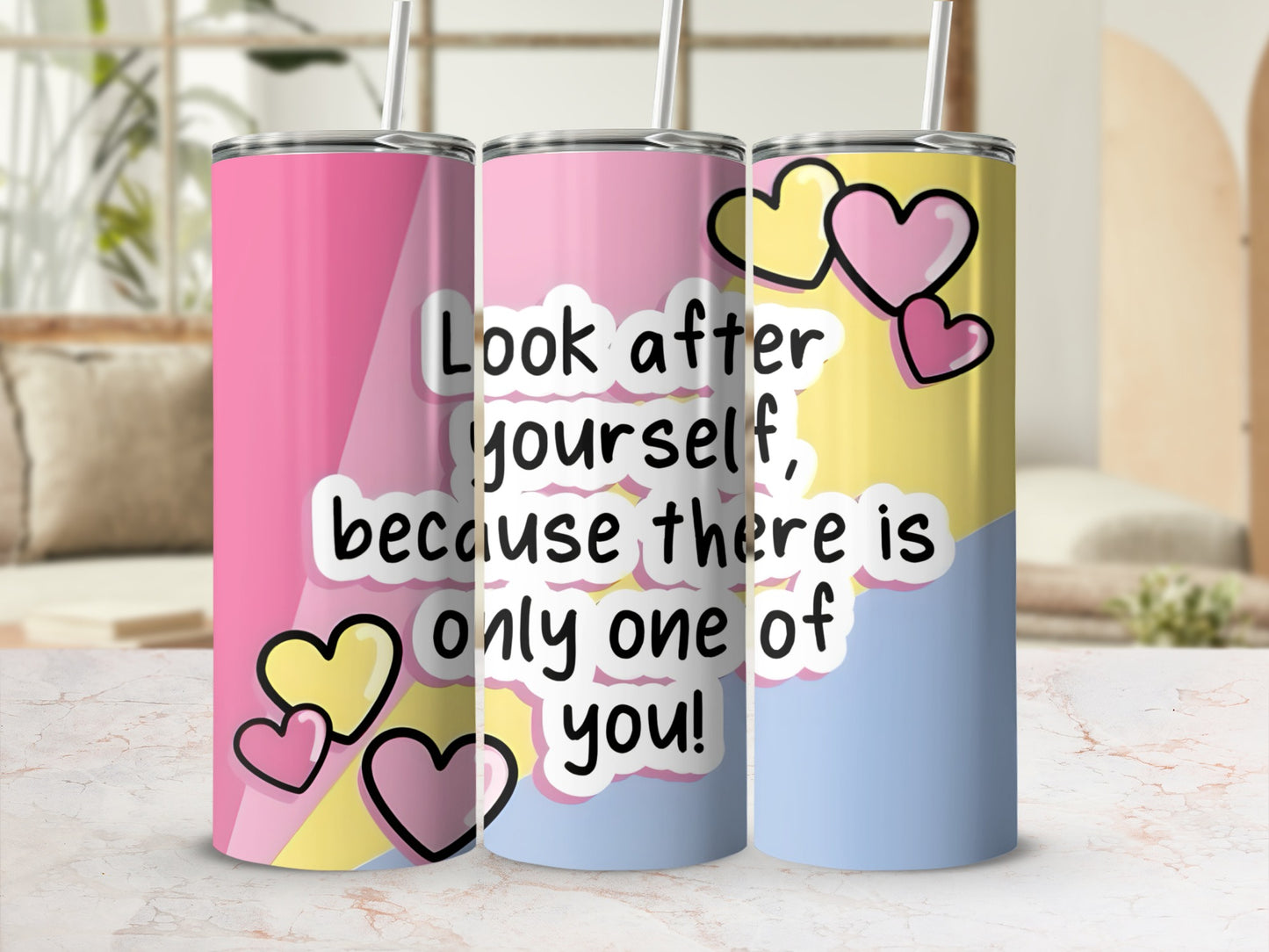 Three tumblers with inspirational quote and heart designs.