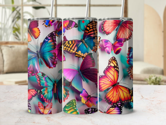 Tumbler with colorful butterfly pattern.