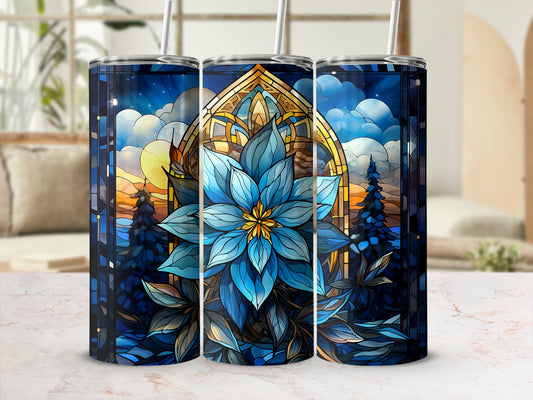 Blue floral stained glass tumbler with celestial sky and pine trees.