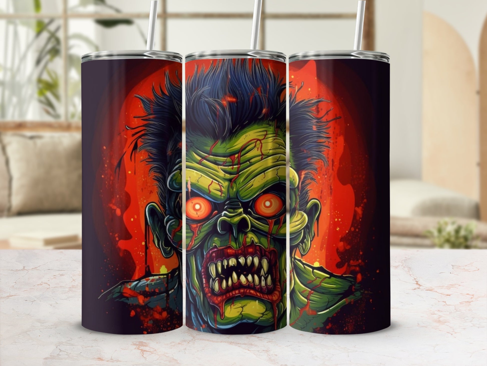Three tumblers featuring a scary zombie illustration with red eyes and fangs.