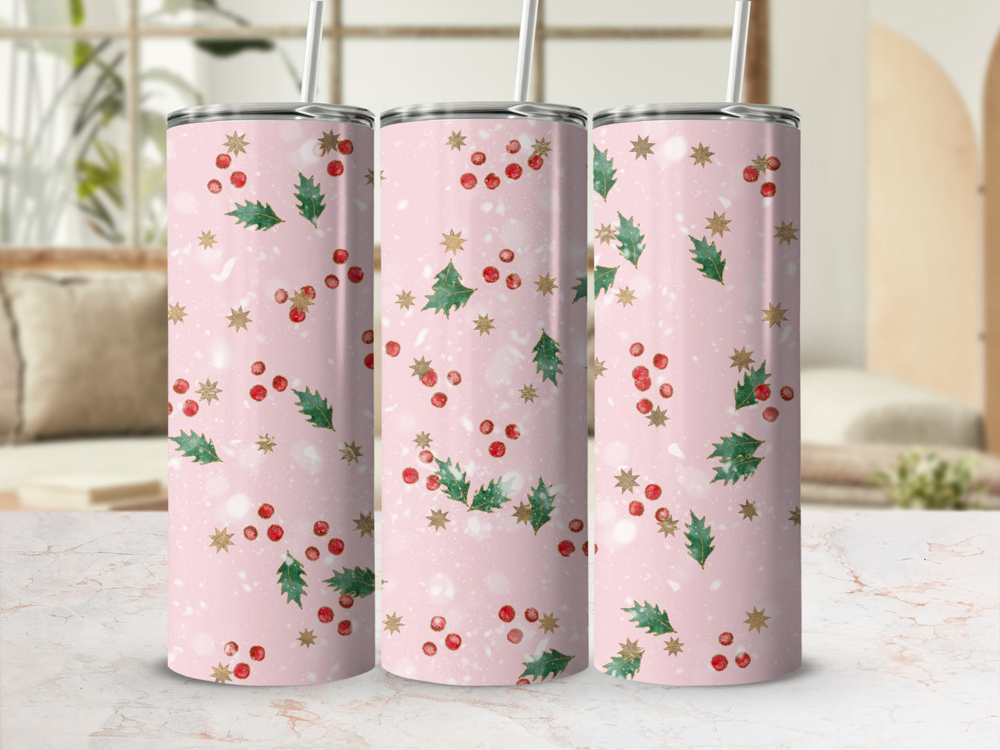 Pink tumbler with holly berries and gold stars holiday pattern.