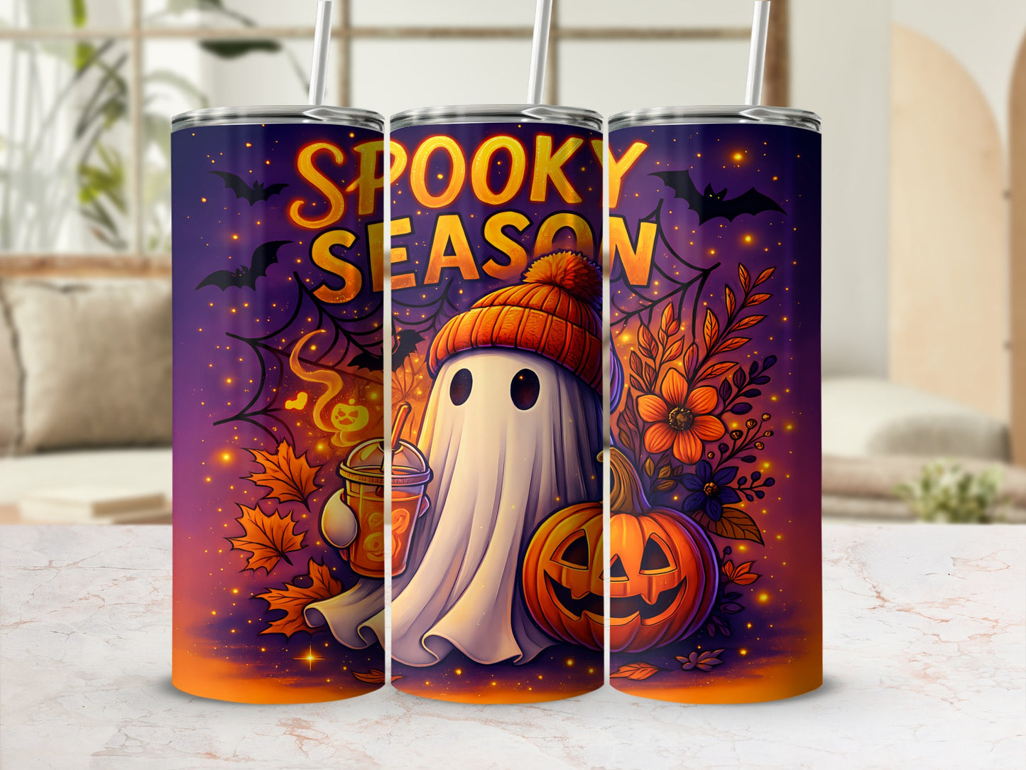 Spooky Season tumbler with ghost, pumpkin, and fall leaves design.