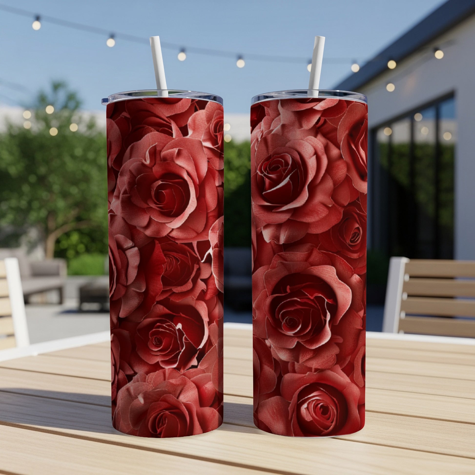 Two tall tumblers with a seamless pattern of red roses.