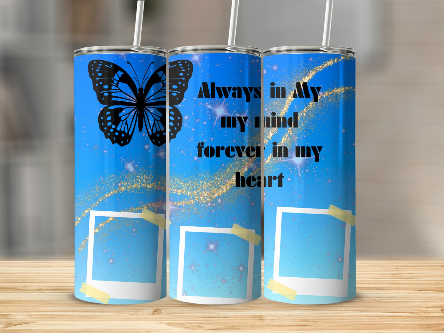 Blue tumbler with butterfly, stars, glitter, and text "Always in my mind forever in my heart."