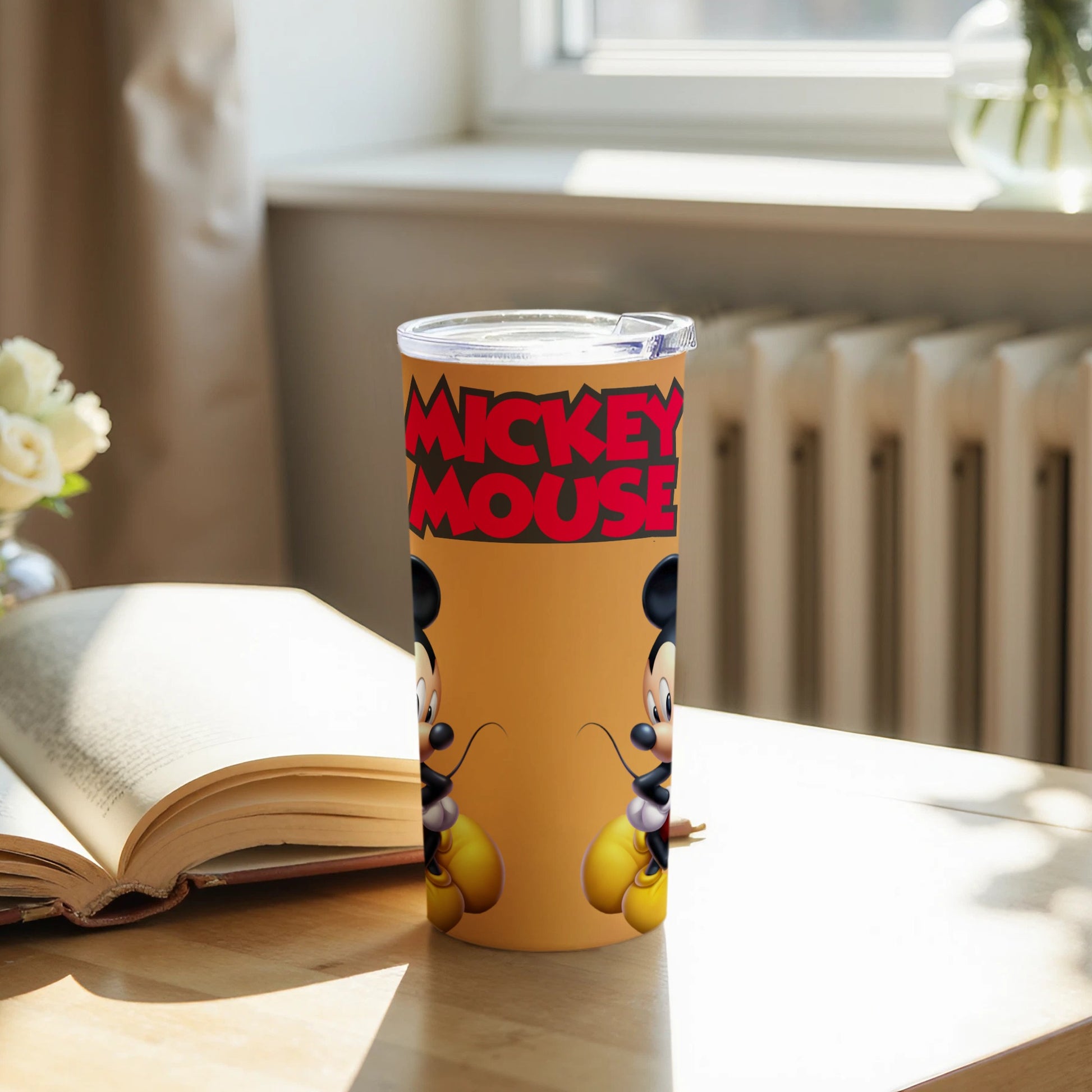 Mickey Mouse themed drink tumbler with classic artwork
