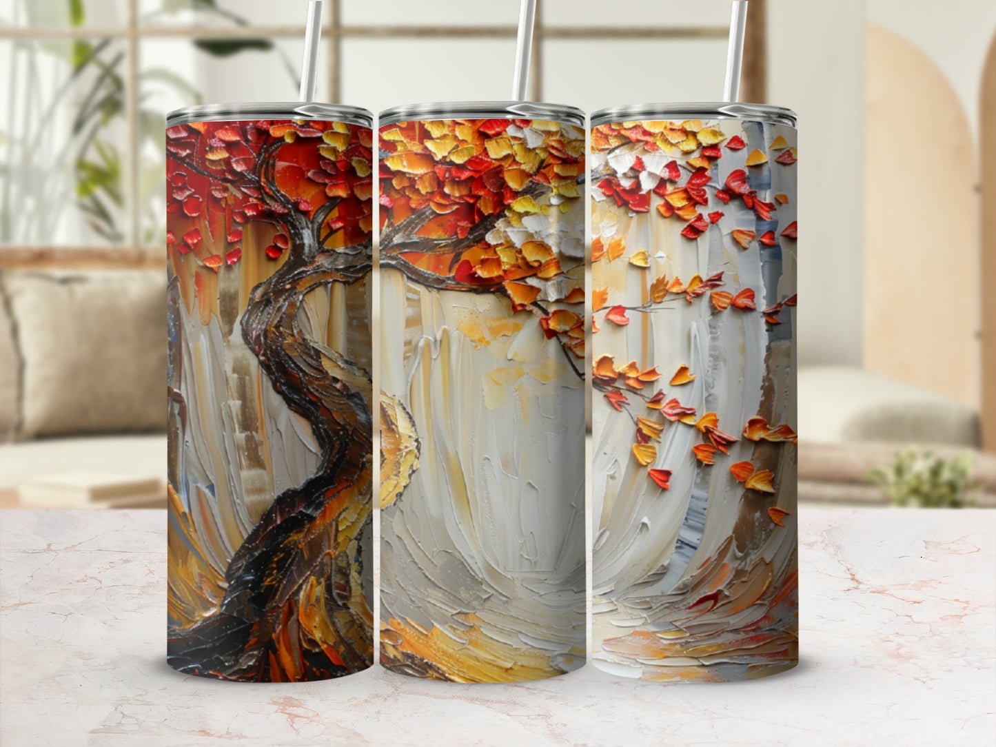 Three tumblers with abstract autumn tree art, warm orange and red leaves.