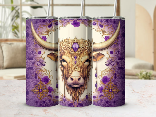 Taurus astrological symbol on purple patterned tumbler with straw.