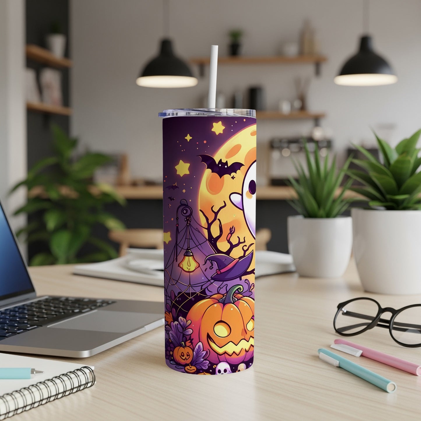 Halloween tumbler with ghost, pumpkin, moon, and bat design.