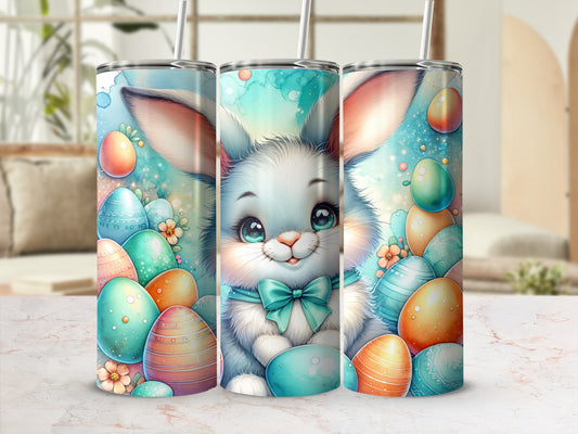 Easter bunny with colorful eggs and flowers on a tumbler.