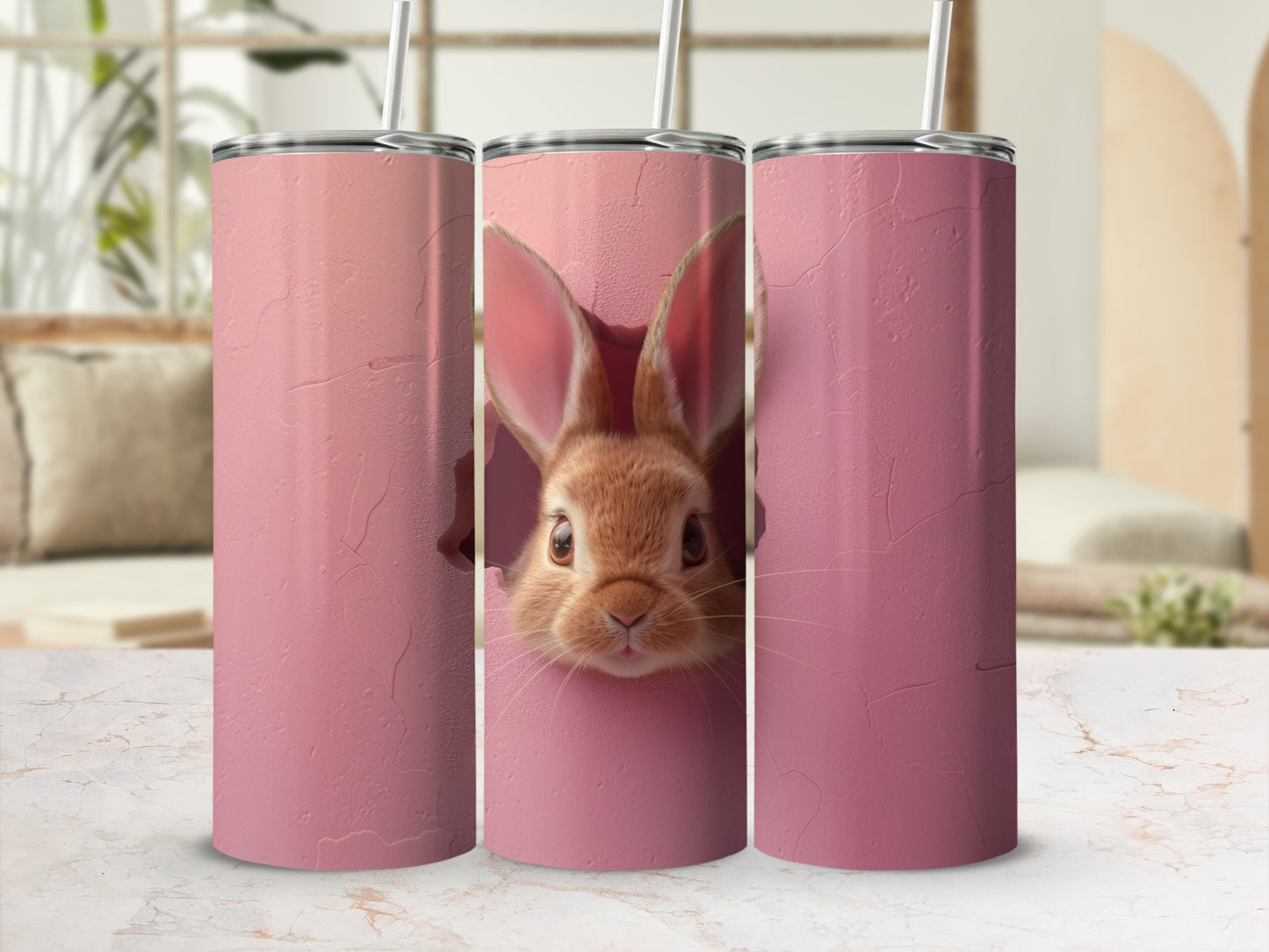 Pink tumbler with a rabbit peeking out of a hole.