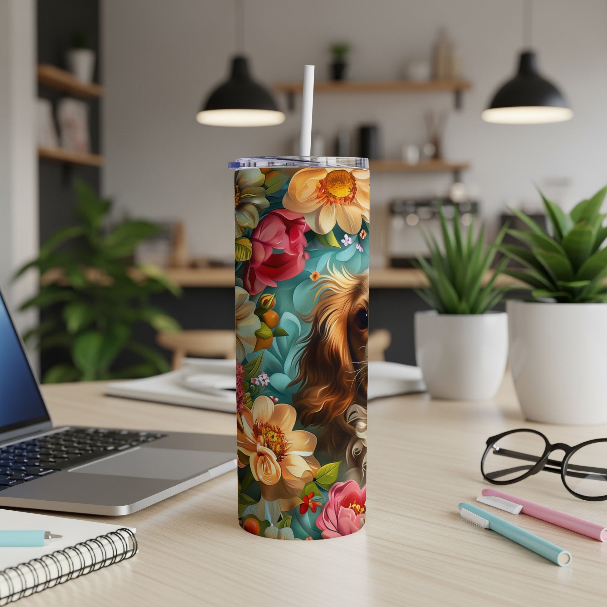 Floral tumbler featuring a dog's face and colorful flowers.