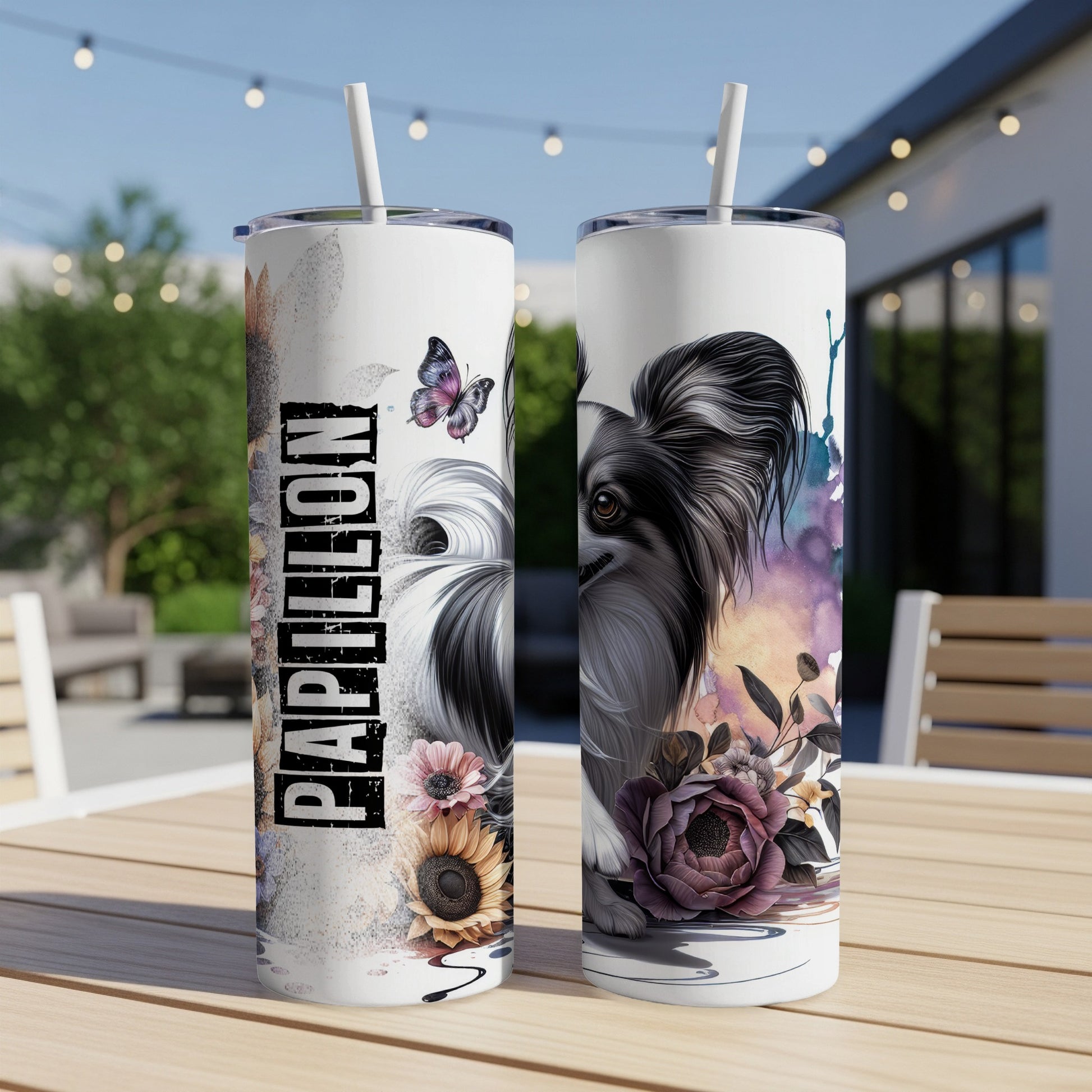 Papillon dog with flowers and butterfly design on a white tumbler.