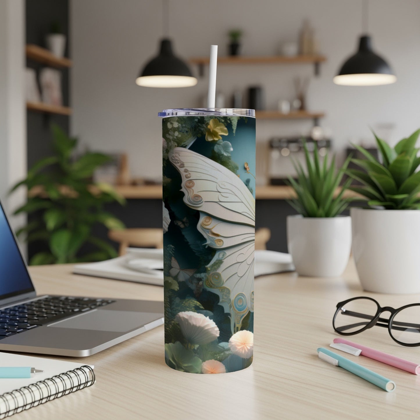Tall tumbler with iridescent butterfly wings and floral design.