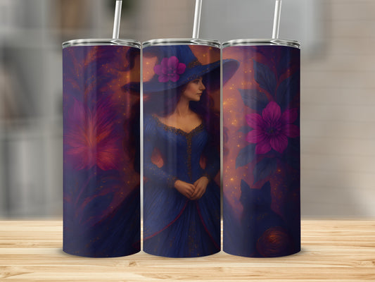 Three tumblers with a witch and floral design on a wooden surface.